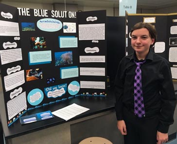 Student presenting at Open House.
